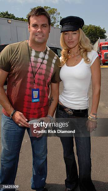Artist Troy Gentry of Montgomery Gentry and Model Elaine Erwin Mellencamp Backstage at Farm Aid 2007 at ICAHN Stadium on Randall's Island, NY...