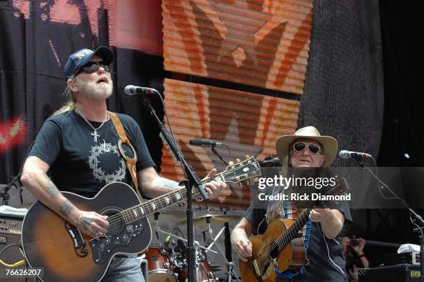 Artist Gregg Allman invites Founding Member of Farm Aid Willie Nelson to join him and play on "Midnight Rider" live at Farm Aid 2007 at ICAHN Stadium...