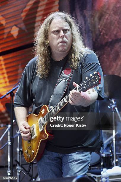 Singer and songwriter Warren Haynes performs with the Allman Brothers Band during Farm Aid at Randall's Island on September 9, 2007 in New York City.