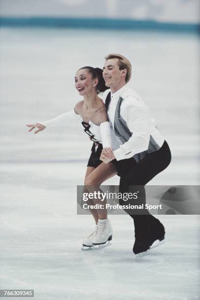 Russian ice dancers Maya Usova and Alexander Zhulin of the Russia team pictured together during competition to finish in 2nd place to win the silver...