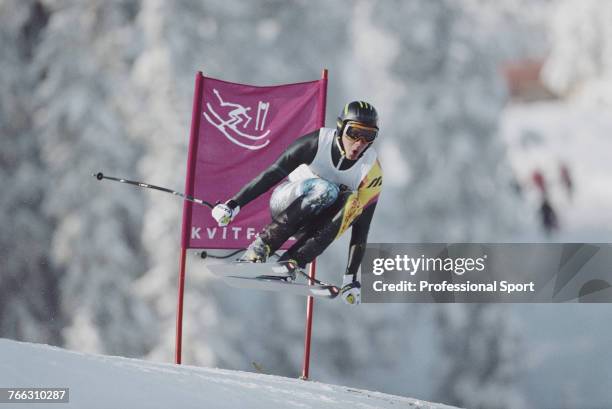 Finnish alpine skier Janne Leskinen pictured competing for the Finland team to finish in 30th place in the Men's downhill skiing event held at...