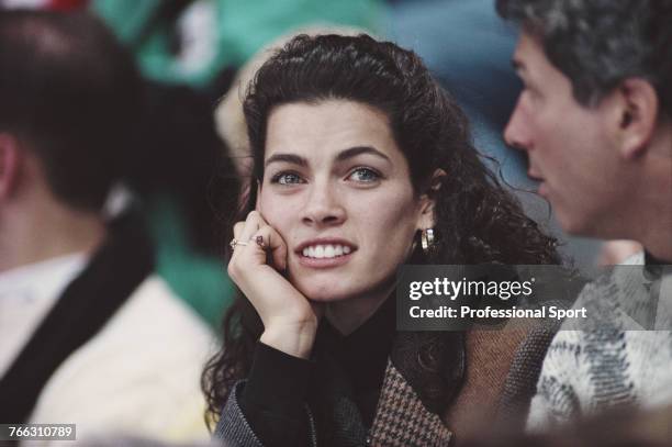 American figure skater Nancy Kerrigan of the United States team pictured watching competition in the figure skating events at the 1994 Winter...