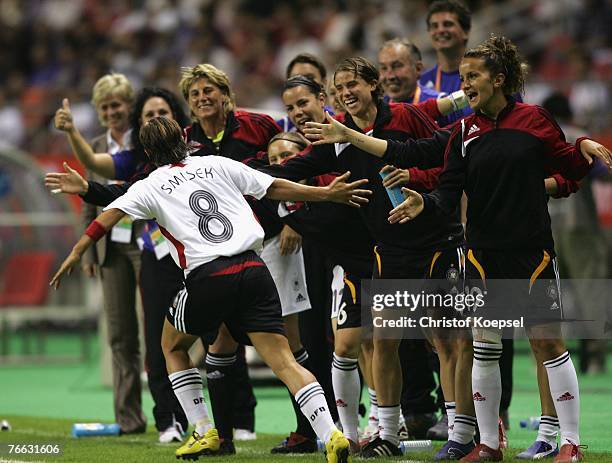 Sandra Smisek of Germany celebrates a goal with the substitute players during the FIFA Women's World Cup 2007 Group A match between Germany and...