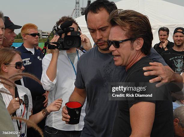 Artist Dave Matthews and Artist John Mellencamp enter The Press Confrence at Farm Aid 2007 AT ICAHN Stadium on Randall's Island, NY September 9,2007.