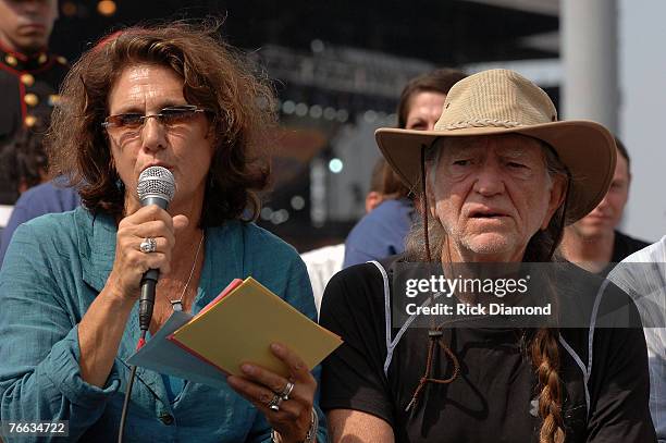 Farm Aid Director Carolyn Mulgar and Farm Aid Founders, Willie Nelson, answer questions during The Farm Aid 2007 Press Confrence at ICAHN Stadium on...