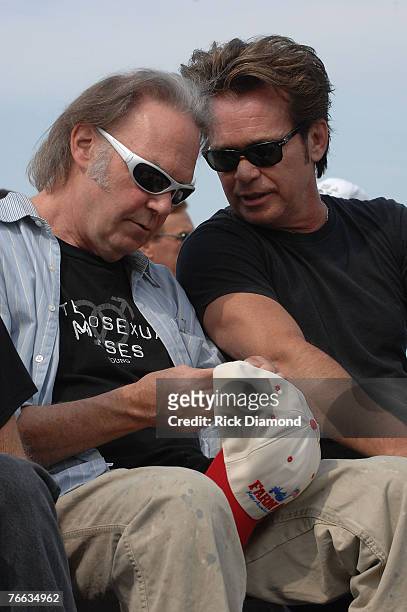 Farm Aid founding members, Neil Young and John Mellencamp answer questions during The Farm Aid 2007 Press Confrence at ICAHN Stadium on Randall's...