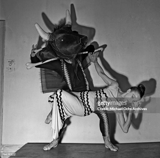 Famed dancer/choreographer Martha Graham rehearses her "Errand of the Maze" dance with an unnamed male dancer on December 30 in New York, New York....