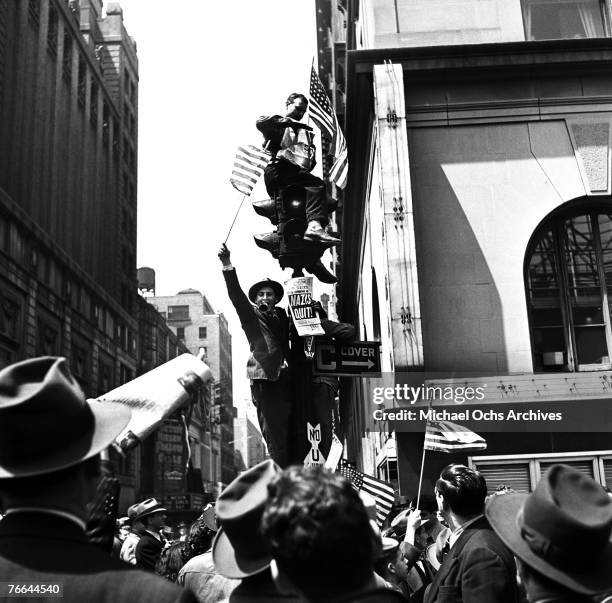 Emotions run high on V-E Day , signalling the end of hostilities in the European theater in World War II, on May 8 in New York, New York.