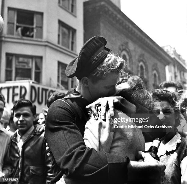 Kiss in Times Square displays the mood of the world on V-E Day , signalling the end of hostilities in the European theater in World War II, on May 8...