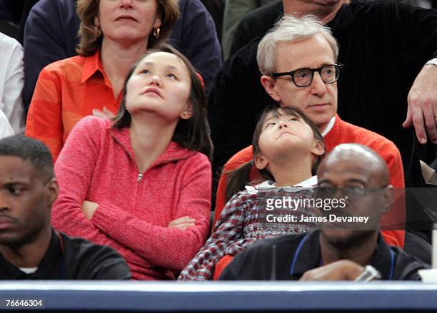 Woody Allen and Soon-Yi Previn with daughter