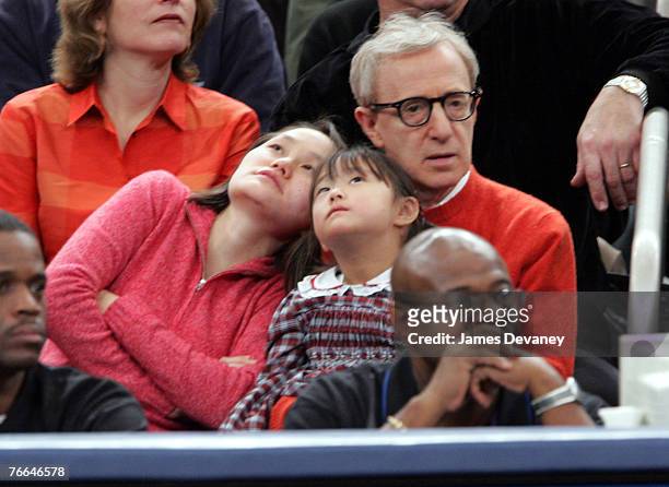 Woody Allen and Soon-Yi Previn with daughter
