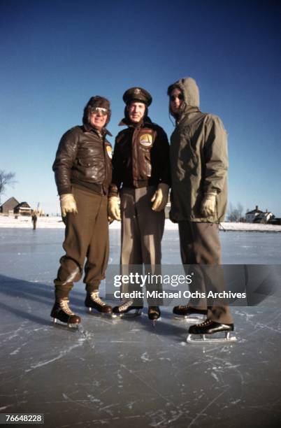 Flight crew from Air transport Command have fun on the ice at a United States Army Air Force base in December 1942 in Goose Bay, Labrador, Canada.