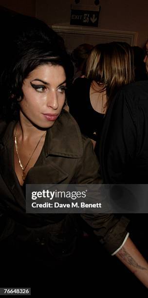 Amy Winehouse attends the after party following Kelly Osbourne's first night as she takes over as Mama Morton in the show Chicago, at the Cambridge...