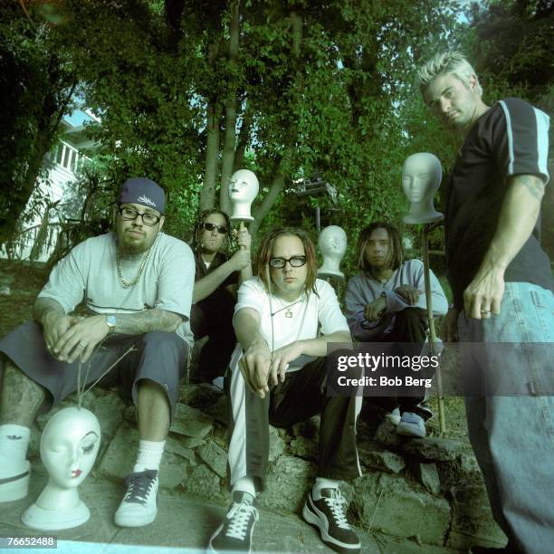 American nu metal rock band Korn drummer David Silveria, lead guitarist James "Munky" Shaffer, lead vocalist Jonathan Davis, lead guitarist Brian...