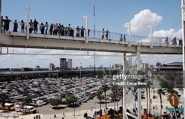 Fans watch from a catwalk, with downtown Jacksonville in the background, as the Jacksonville Jaguars take on the Tennessee Titans at Alltel Stadium...