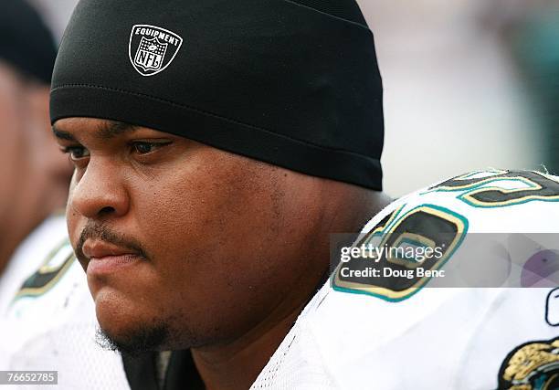 Offensive lineman Khalif Barnes of the Jacksonville Jaguars takes a break on the bench against the Tennessee Titans at Alltel Stadium on September 9,...