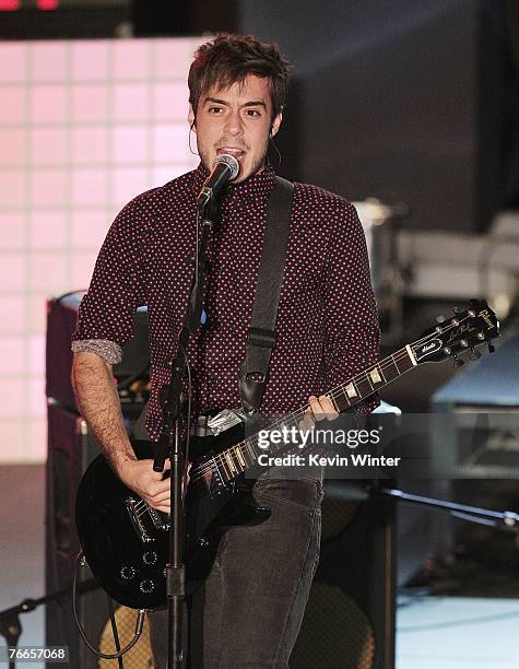 Musician Jose "Pepe" Madero, of the rock band Panda, performs onstage during the taping of MTV Tr3's "Mi TRL" at the California Plaza on September...