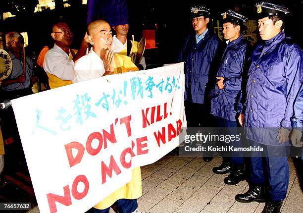 Japanese Buddhist monks and peace activists protest against the dispatch of Self-Defense Force vessels to the Indian Ocean under the special...