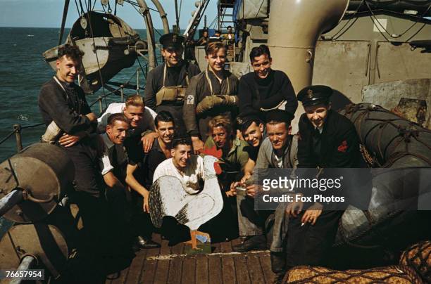 Members of the crew of a Royal Navy ship on patrol in the Atlantic, circa 1943.