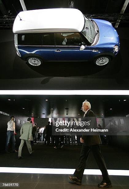 Visitor passes the Mini Cooper stand during the pressdays of the 62nd International Motorshow IAA on September 11, 2007 in Frankfurt, Germany. From...