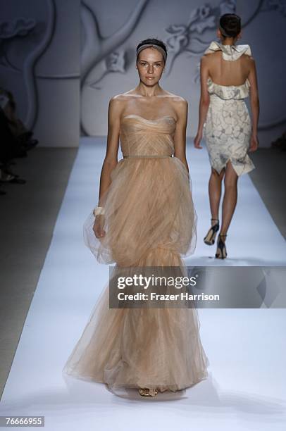 Model walks the runway during the Monique LHuillier 2008 Fashion Show at The Promenade in Bryant Park during the Mercedes-Benz Fashion Week Spring...