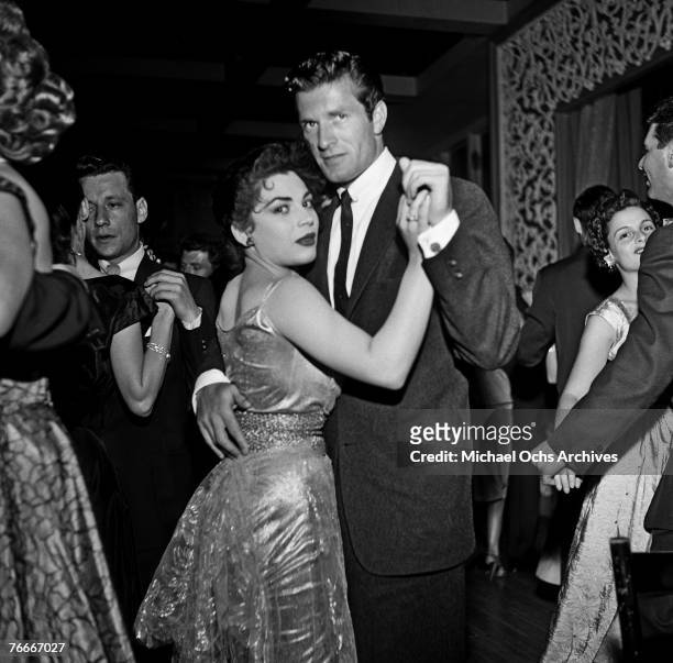 Actor Hugh O'Brian dances at Ciro's nightclub, a famous watering hole for the Hollywood elite along the Sunset Strip, on May 10 in Hollywood,...