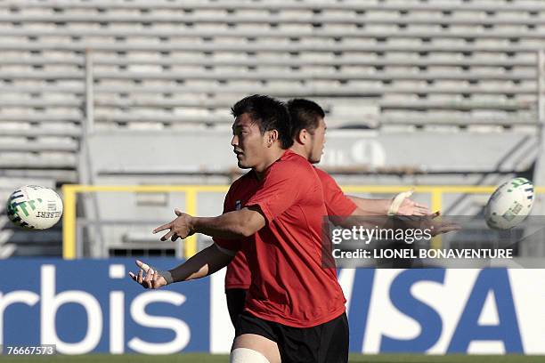 Japan's rugby union national team hooker Taku Inokuchi practices during the captain's run training session at the stadium in Toulouse, southern...