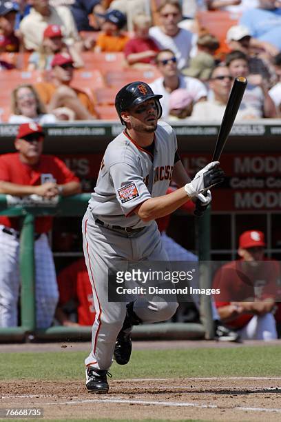 Secondbaseman Kevin Frandsen of the San Francisco Giants watches the ball he's just hit during a game on September 2, 2007 against the Washington...