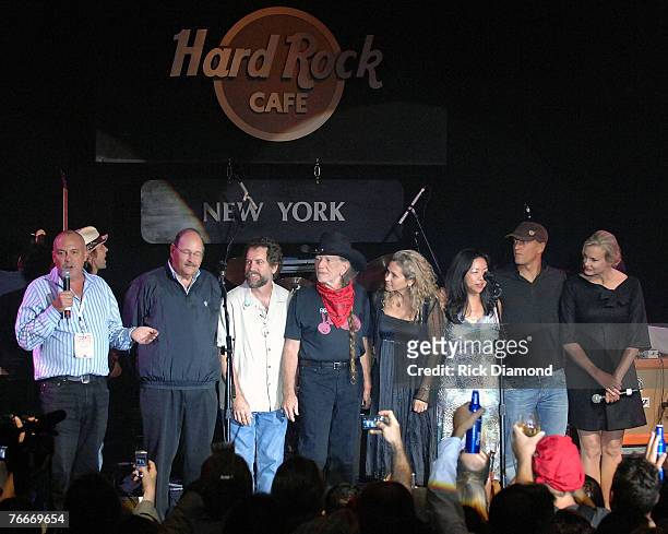 Mike Bowman, Board Member SBA, Musician Willie Nelson and Harnish Dobbs, CEO of Hard Rock Cafe International and others Present The Sustainable...