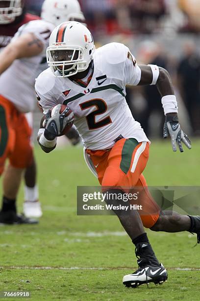 Graig Cooper of the Miami Hurricanes runs with the ball against the Oklahoma Sooners at Gaylord Family-Oklahoma Memorial Stadium on September 8, 2007...