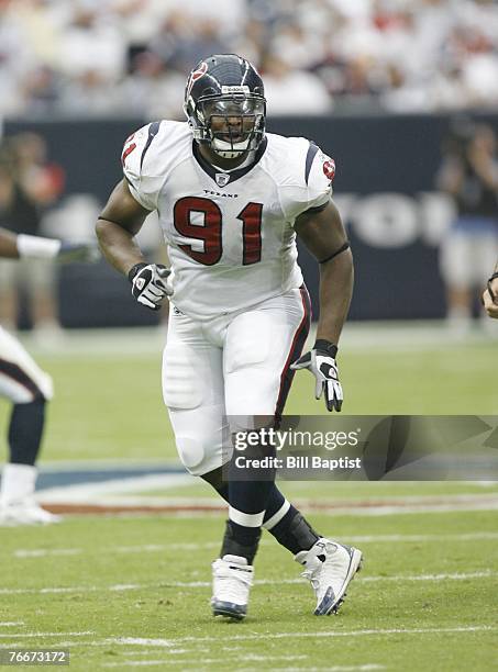 Defensive end Amobi Okoye of the Houston Texans rushes the quarterback during the game between the Houston Texans and the Kansas City Chiefs at...