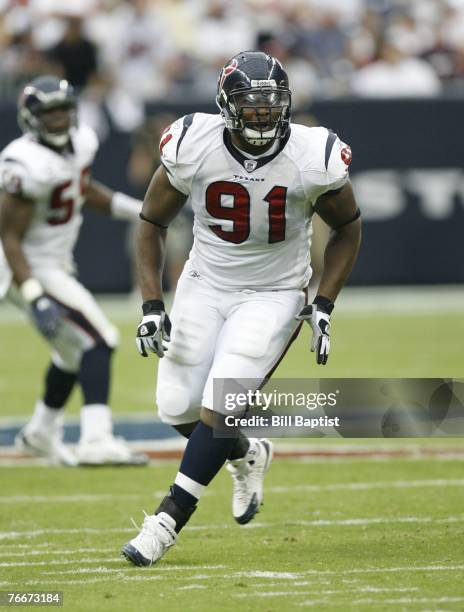 Defensive end Amobi Okoye of the Houston Texans rushes the quarterback during the game between the Houston Texans and the Kansas City Chiefs at...