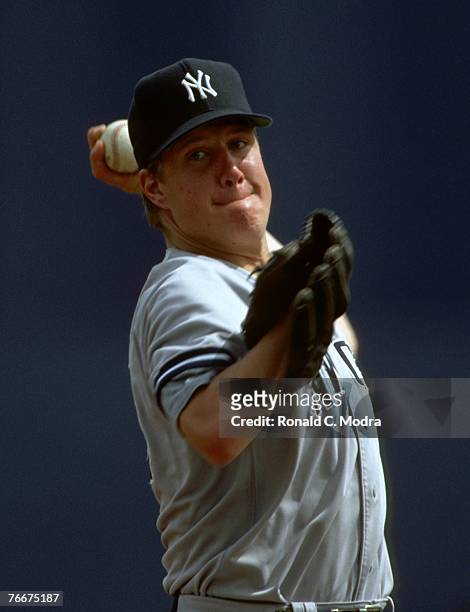 Jim Abbott of the New York Yankees pitching during spring training in March 1993 in West Palm Beach, Florida.