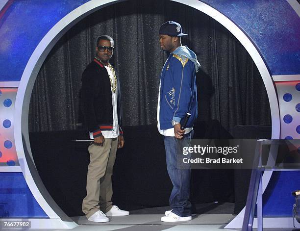 Recording artists Kanye West and 50 Cent appear on BET's 106 & Park at BET Studios September 11, 2007 in New York City.