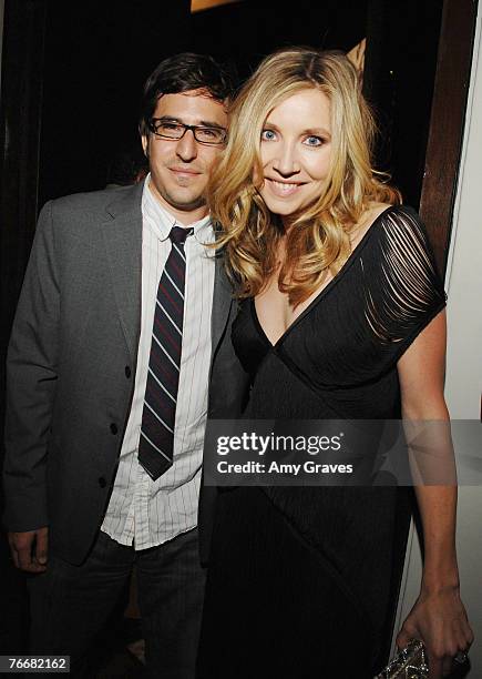 Actress Sarah Chalke and guest attend the Los Angeles Confidential Pre-Emmy Party hosted by Ellen Pompeo on September 11, 2007 in Los Angeles,...