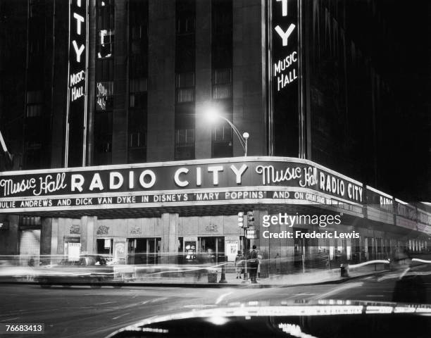 Radio City Music Hall in the Rockefeller Center, New York, 1964. Currently showing is Disney's 'Mary Poppins'.