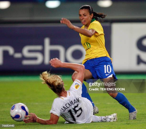 Brazil's Marta Vieira Da Silva fights for the ball with New Zealand's Maia Jackman during their Group D Women's World Cup 2007 football match, in...