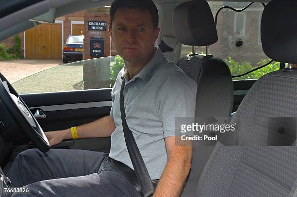Gerry McCann leaves his home today to take their children Amelie and Sean to a local play park on September 12, 2007 in Rothley, England. Portugal's...