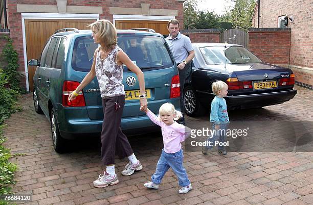 Kate and Gerry McCann leave their home today to take their children Amelie and Sean to a local play park on September 12, 2007 in Rothley, England....
