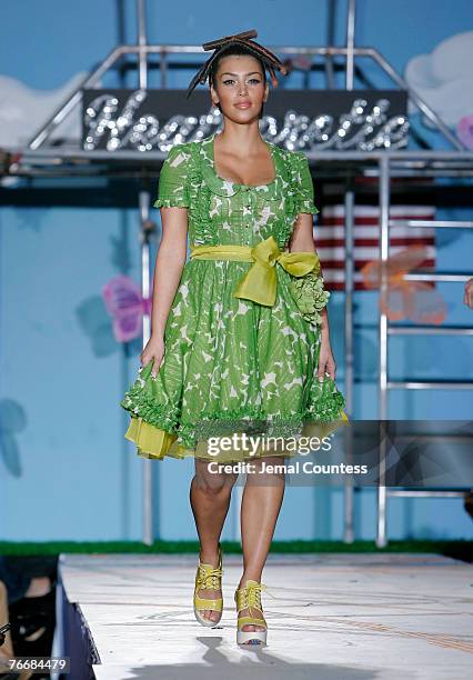 Kim Kardashian walks the runway wearing Heatherette Spring 2008 during Mercedes-Benz Fashion Week at Gotham Hall on September 11, 2007 in New York...