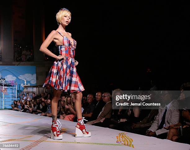 Actress Jenna Jameson walks the runway wearing Heatherette Spring 2008 during Mercedes-Benz Fashion Week at Gotham Hall on September 11, 2007 in New...