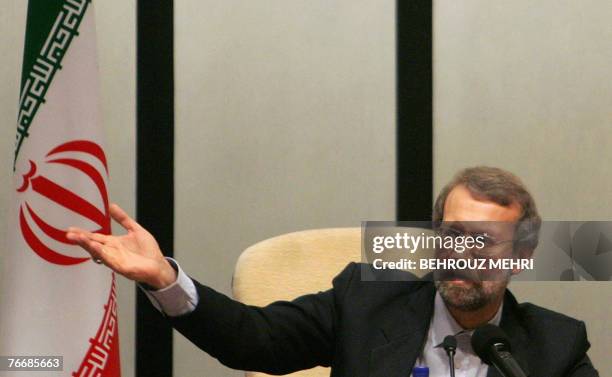 Iran's top nuclear negotiator Ali Larijani speaks during a press conference in Tehran, 12 September 2007. Iran warned today its current policy of...