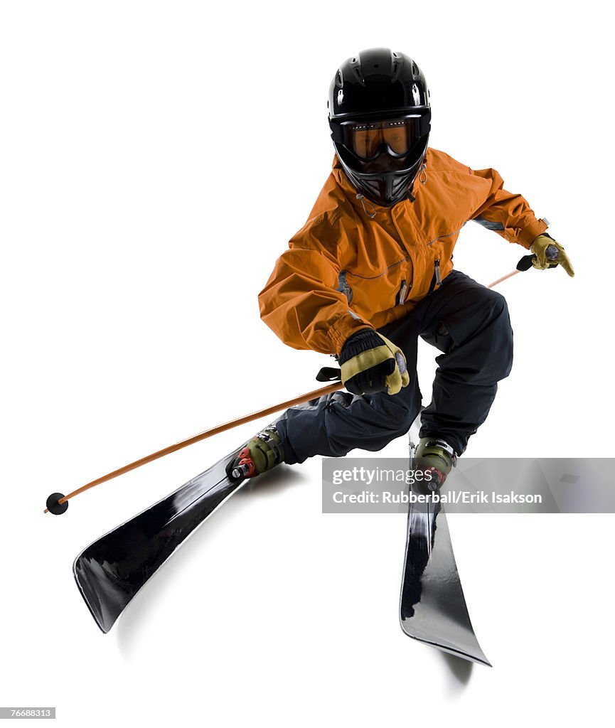 Man with skis helmet and poles
