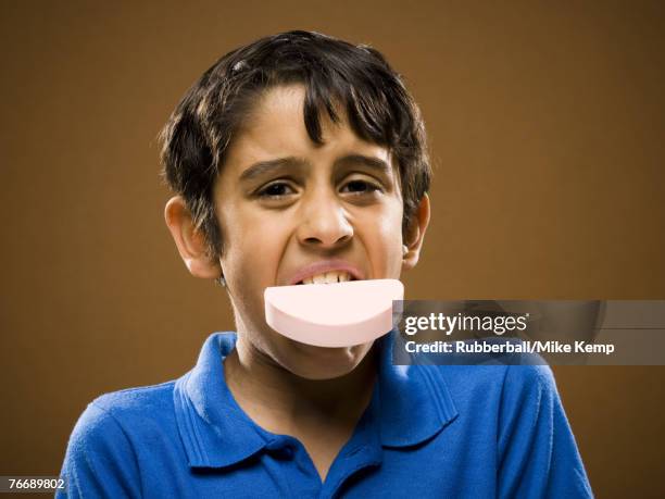boy with bar of soap in mouth - bar of soap in mouth stock pictures, royalty-free photos & images
