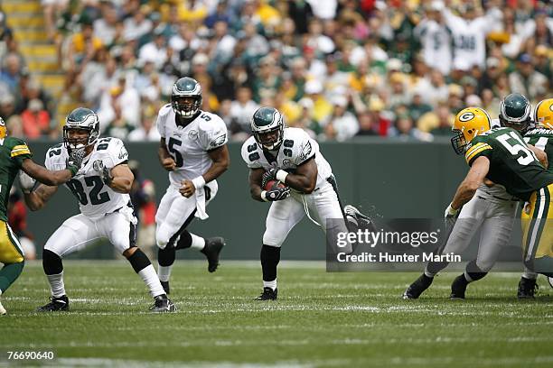 Fullback Thomas Tapeh of the Philadelphia Eagles carries the ball during a game against the Green Bay Packers on September 9, 2007 at Lambeau Field...
