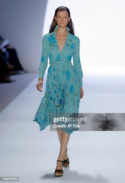 Model walks the runway wearing Anne Klein Spring 2008 during Mercedes-Benz Fashion Week at the Promenade, Bryant Park on September 12, 2007 in New...