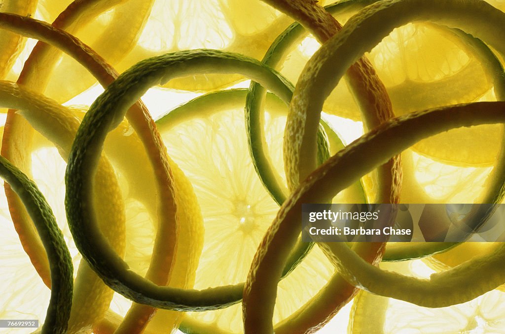 Orange and lime slices and peels