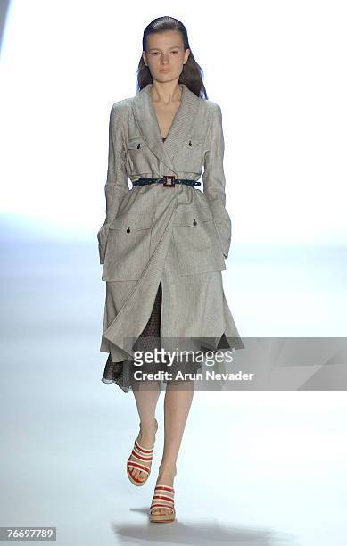Model walks the runway wearing Anne Klein Spring 2008 during Mercedes-Benz Fashion Week at the Promenade, Bryant Park on September 12, 2007 in New...