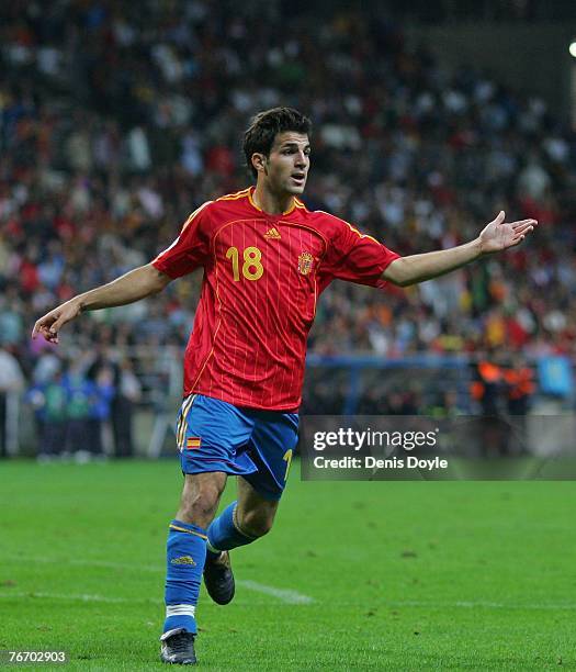 Cesc Fabregas of Spain communicates with a teammate after coming on as a substitute during the UEFA Euro 2008 group F qualifier between Spain and...
