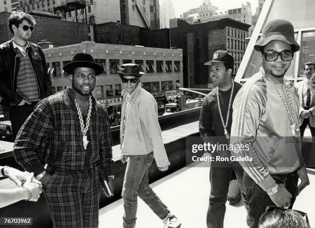 Adam Yauch and Adam Horovitz of the Beastie Boys with Jason Mizell, Joseph Simmons and Darryl McDaniels of Run-DMC